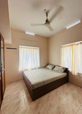 Home at Guruvayur 2 AC Room,1 single bed,Kitchen